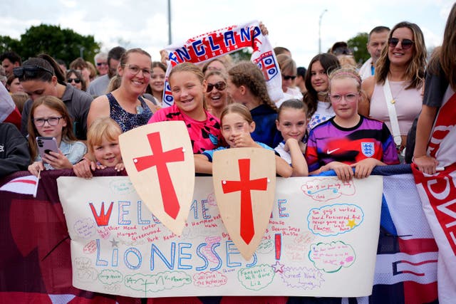 England fans waiting outside London Southend Airport for the England team to arrive (Yui Mok/PA)