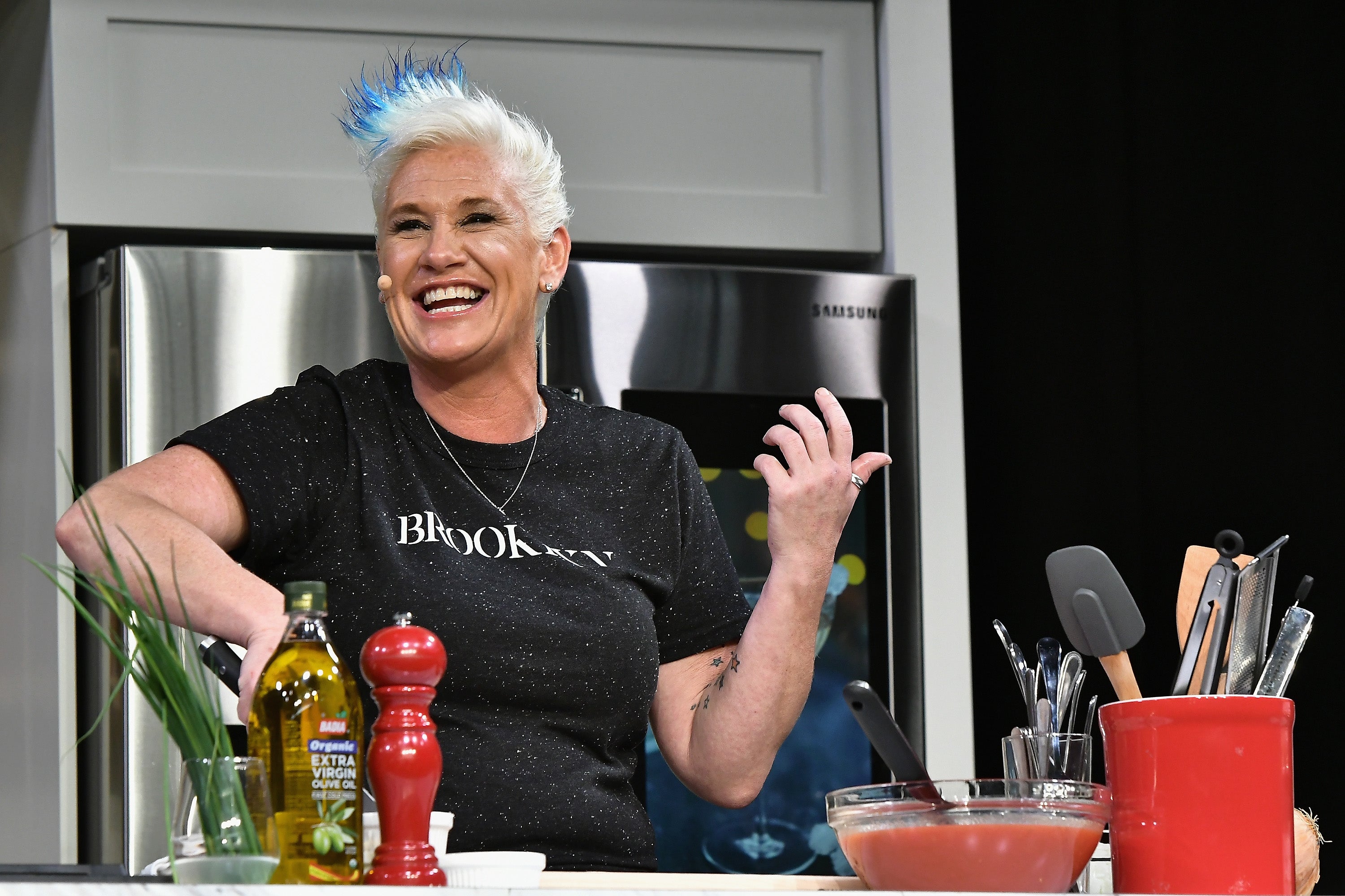 Chef Anne Burrell prepares a dish at the Food Network & Cooking Channel New York City Wine & Food Festival