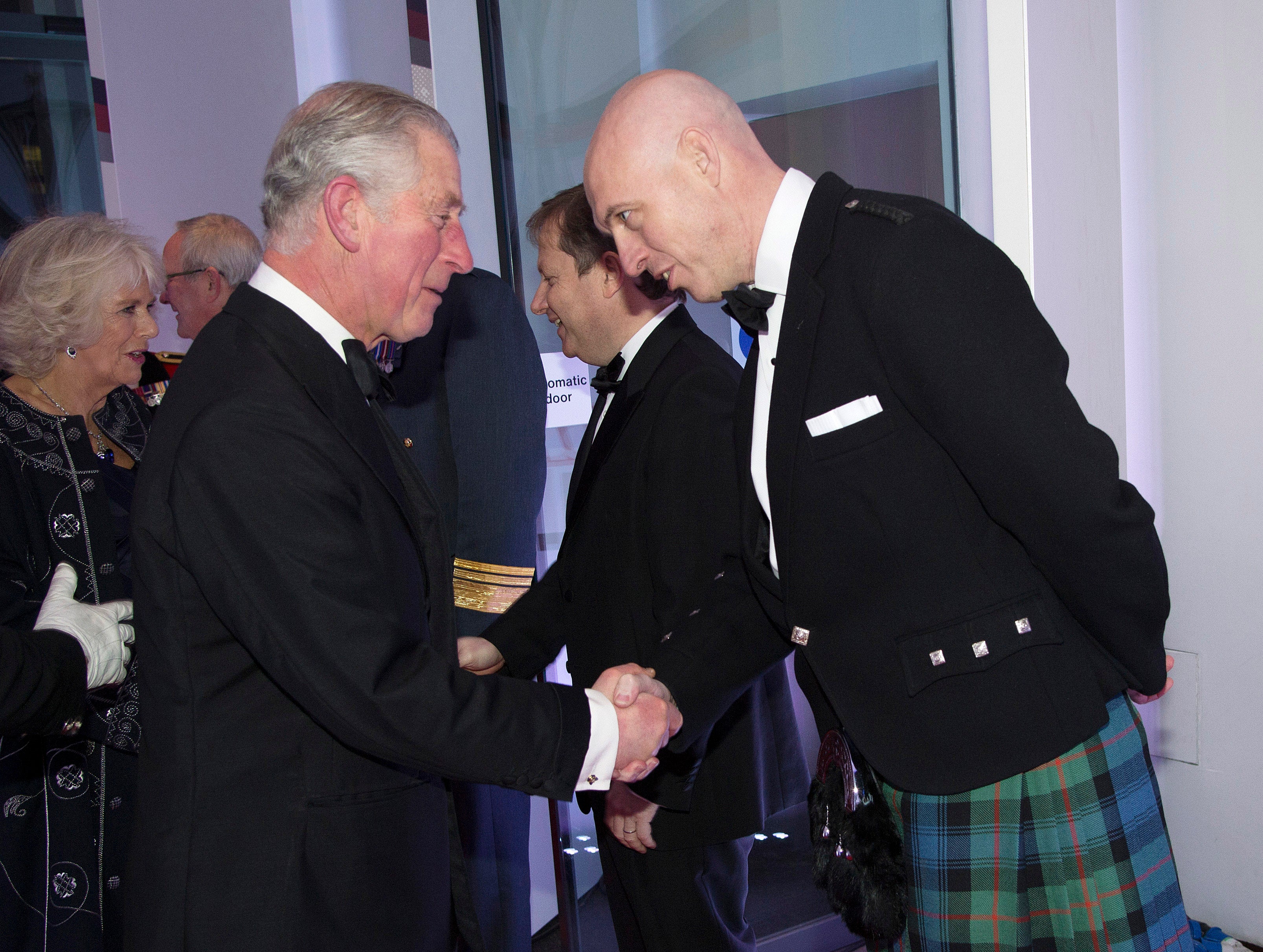 David Dinsmore meets the then Prince Charles in 2014