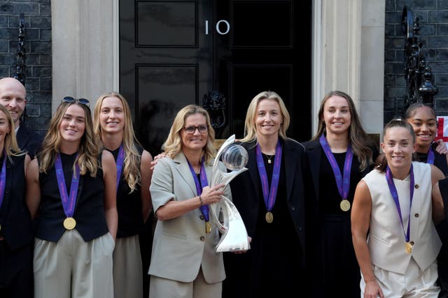 England manager Sarina Wiegman and the Lionesses with the Euro 2025 trophy as they attended a reception at 10 Downing Street (Lucy North/PA)