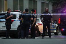 Police officer among four killed in shooting at New York office building