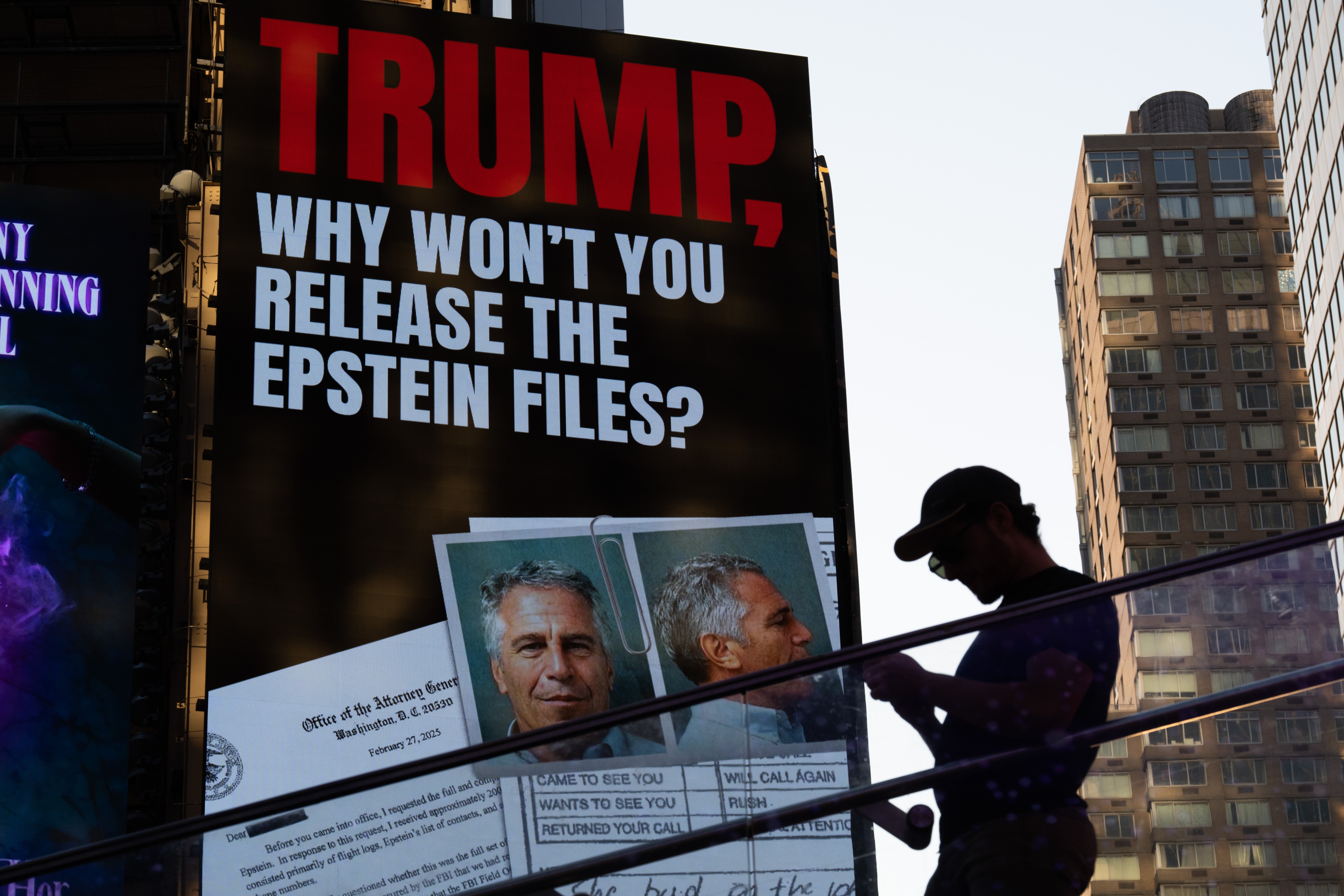 A billboard in New York’s Times Square calls for the release of the Epstein files