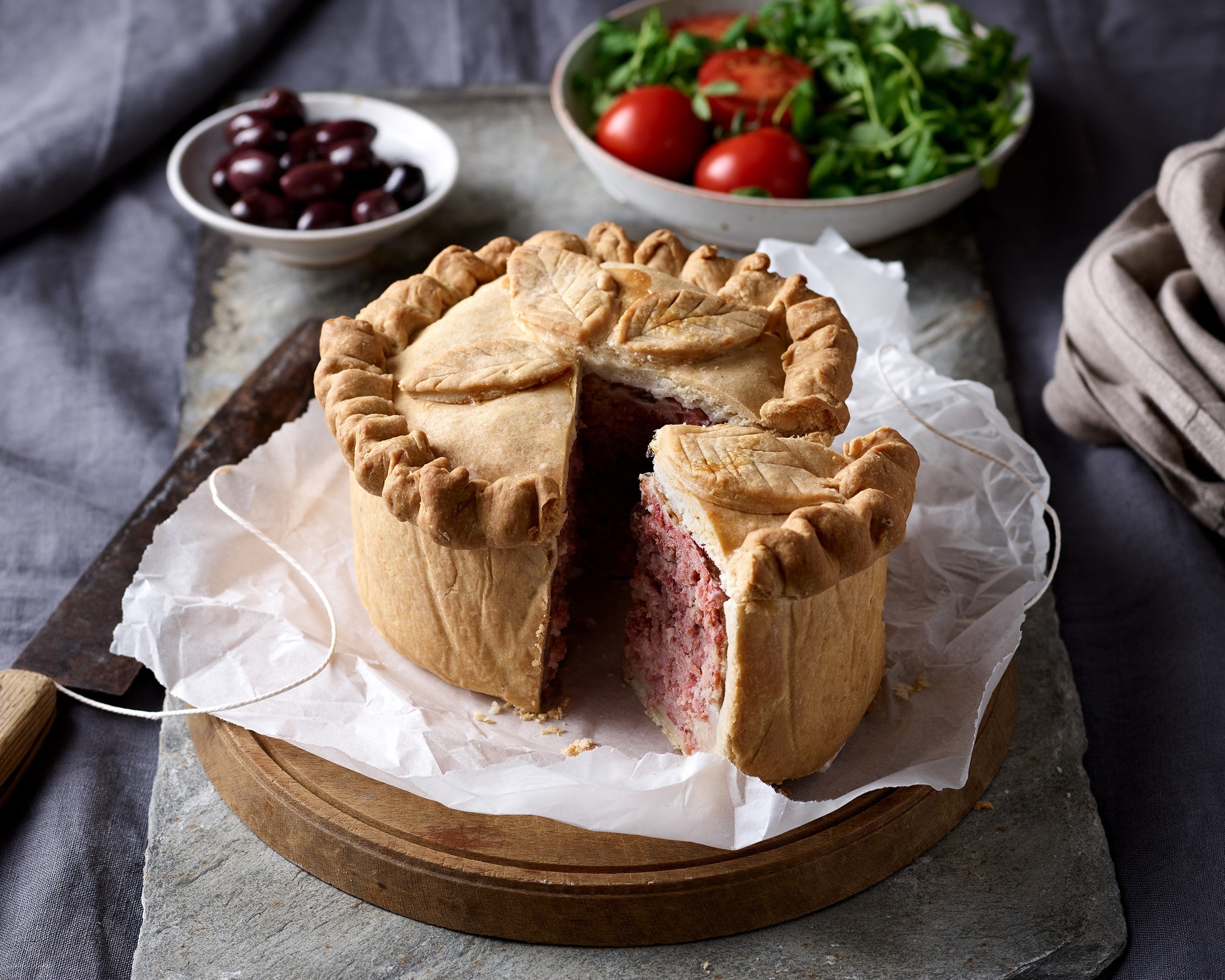 This traditional pork pie is best served cold and slices beautifully for sharing