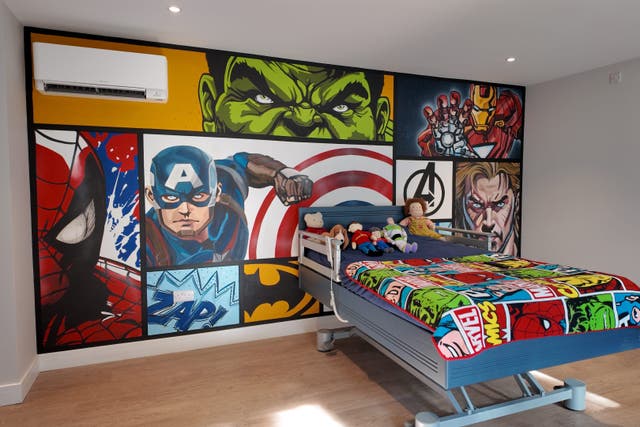 Volunteers from the national construction charity Band of Builders completed renovations at the home of disabled boy Toby Fletcher, 16, after his father died (Band of Builders/ PA)