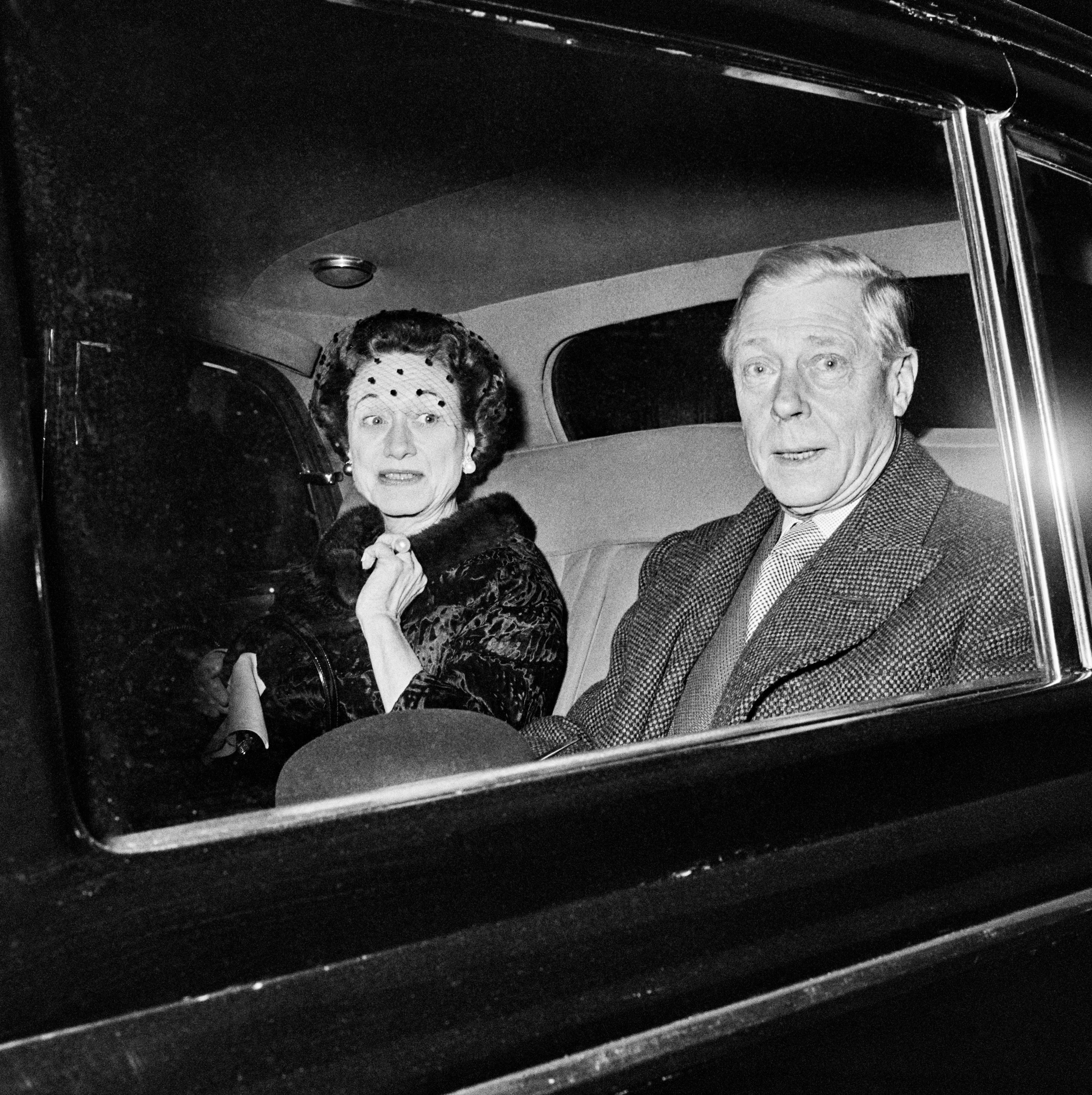 The Duke and Duchess of Windsor in the back of a car during a visit to London, 14 December 1959