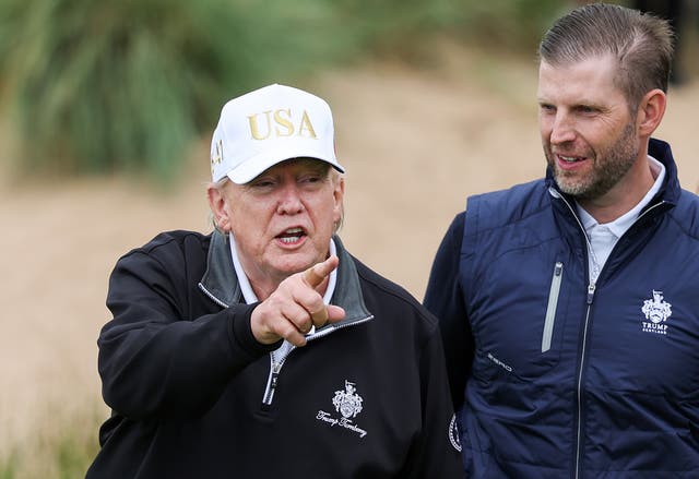 <p>President Donald Trump stands next to Eric Trump at the ribbon-cutting ceremony at a new 18-hole course at Trump International Golf Links on July 29, 2025 in Balmedie, near Aberdeen, Scotland</p>