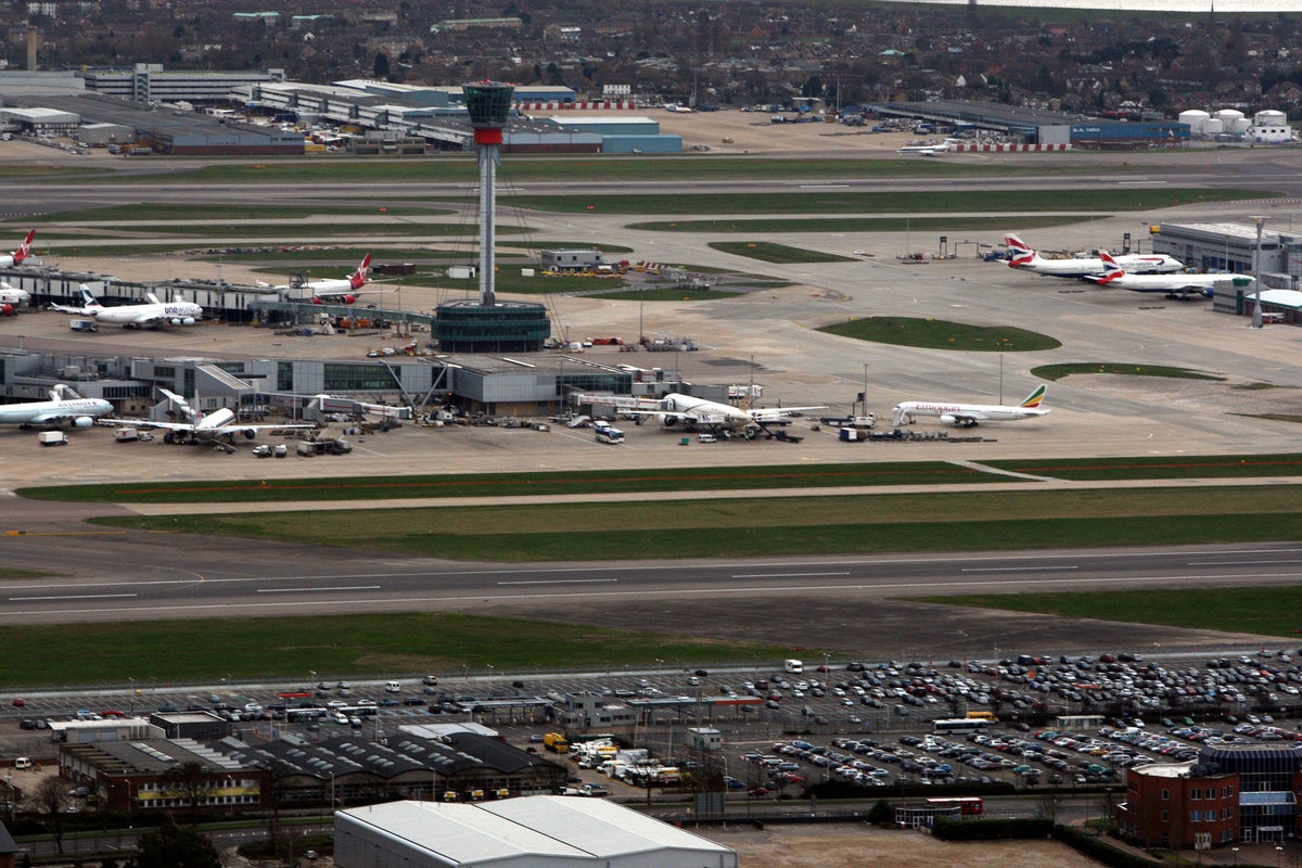 Passenger arrested at Heathrow airport ‘after punching flight attendant and trying to open plane door’