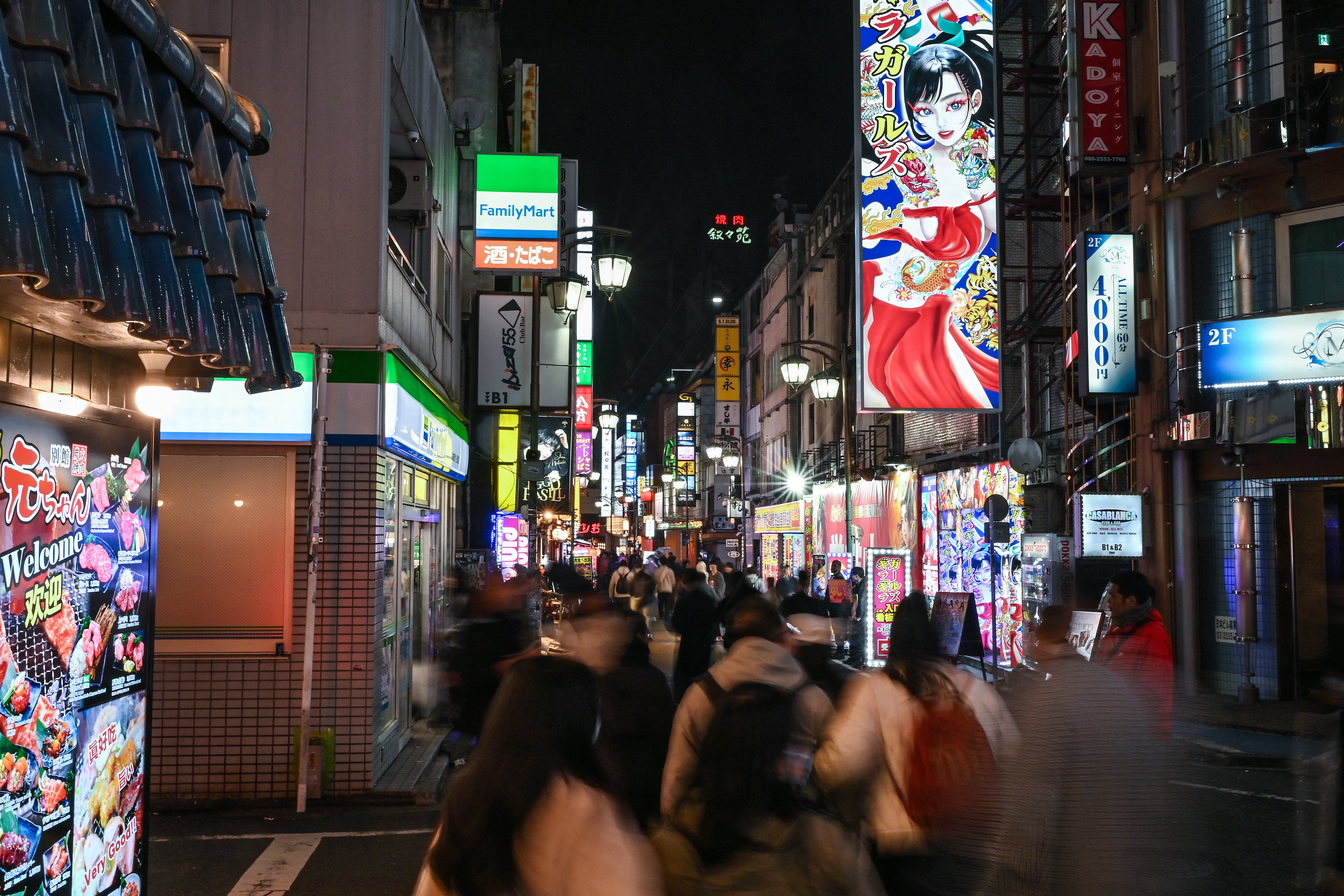 File. Signs declaring a host as ‘No 1’, ‘King’ or urging passersby to ‘drown in love’ are no longer permitted after Tokyo police banned exaggerated billboards and slogans in Kabukichō