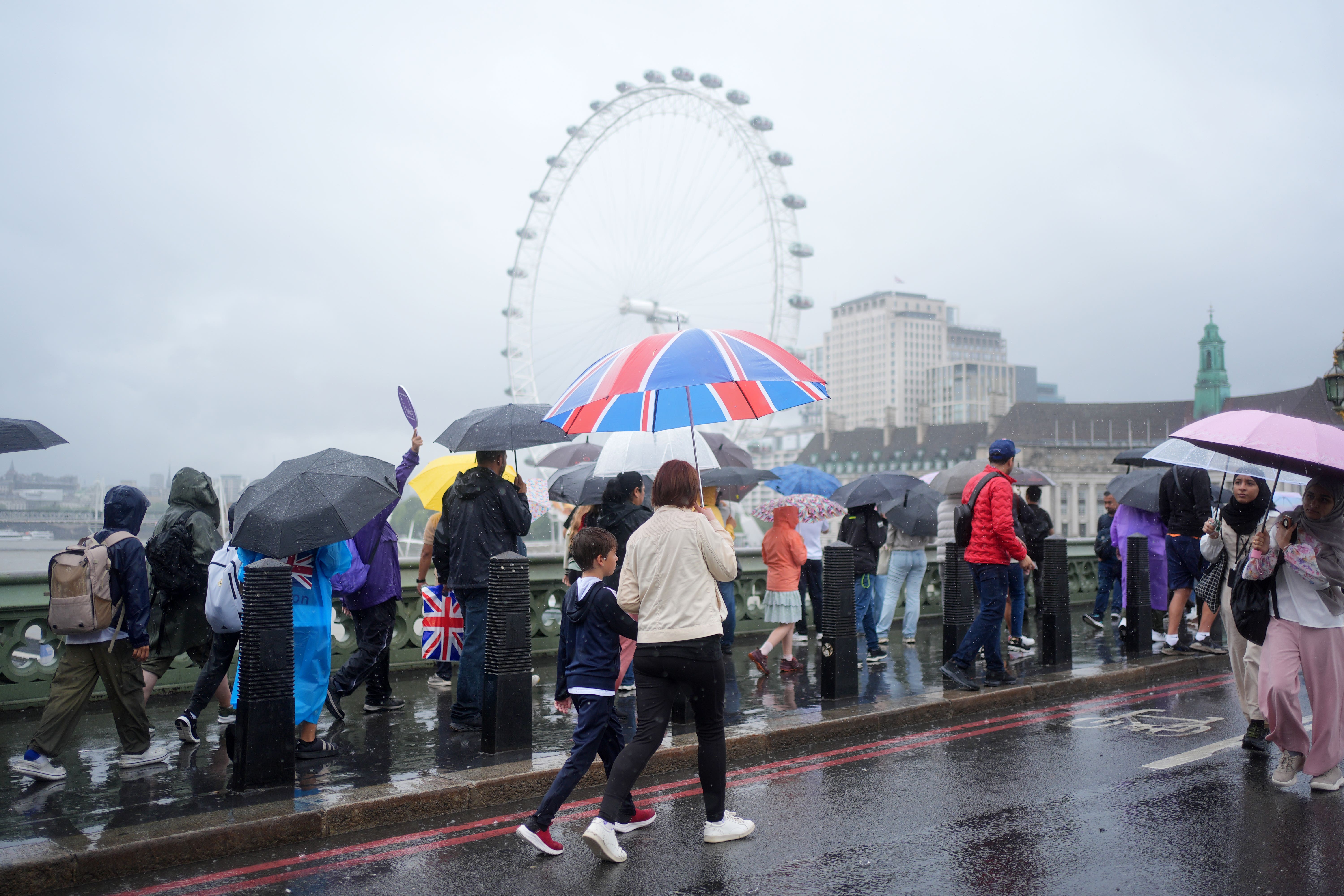Rain on Westminster Bridge, London, on July 19 (Yui Mok/PA)