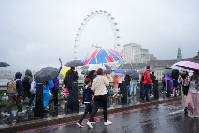 Rain on Westminster Bridge, London, on July 19 (Yui Mok/PA)