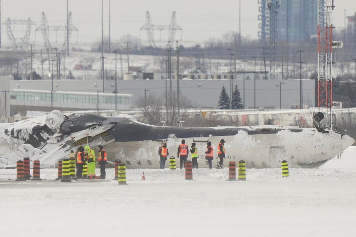Flight Attendant on plane that flipped over during landing blames ...
