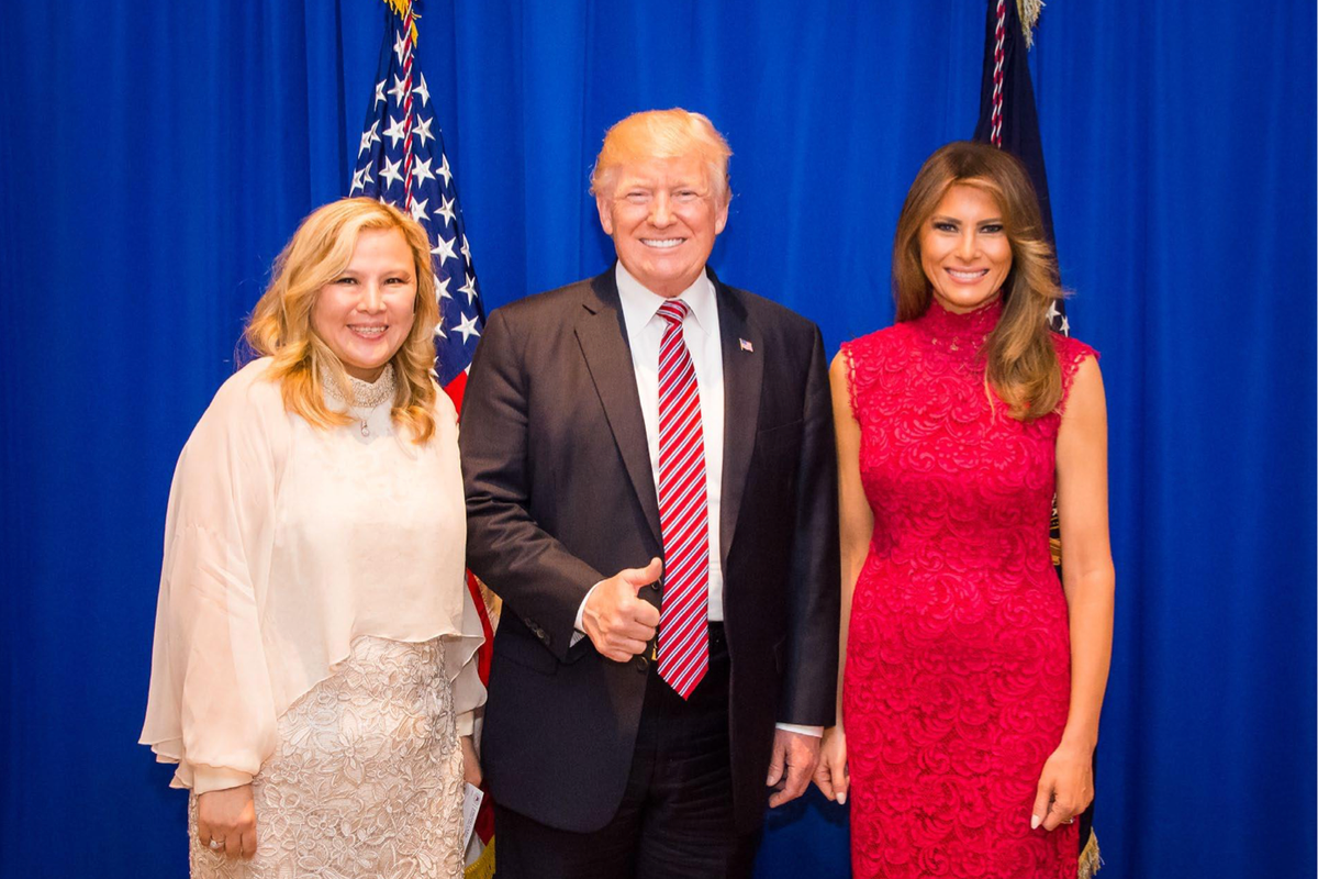 https://static.independent.co.uk/2025/07/31/13/43/Sherry-Xue-Li-poses-with-Donald-Trump-and-Melania-Trump-at-a-fundraiser-dinner-in-June-2017-a-photo.png?trim=7,0,181,0&width=1200&height=800&crop=1200:800