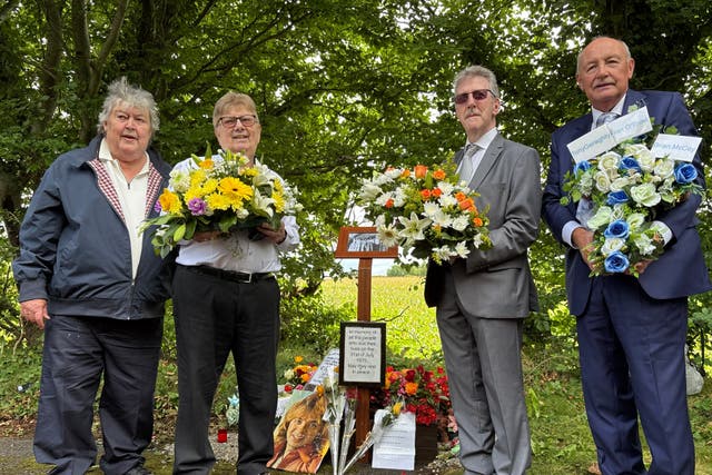 Surviving Miami Showband members (left to right) Ray Miller, Des Lee, Stephen Travers, and former road manager Brian Maguire at the memorial to the fallen Miami Showband members (Rebecca Black/PA)