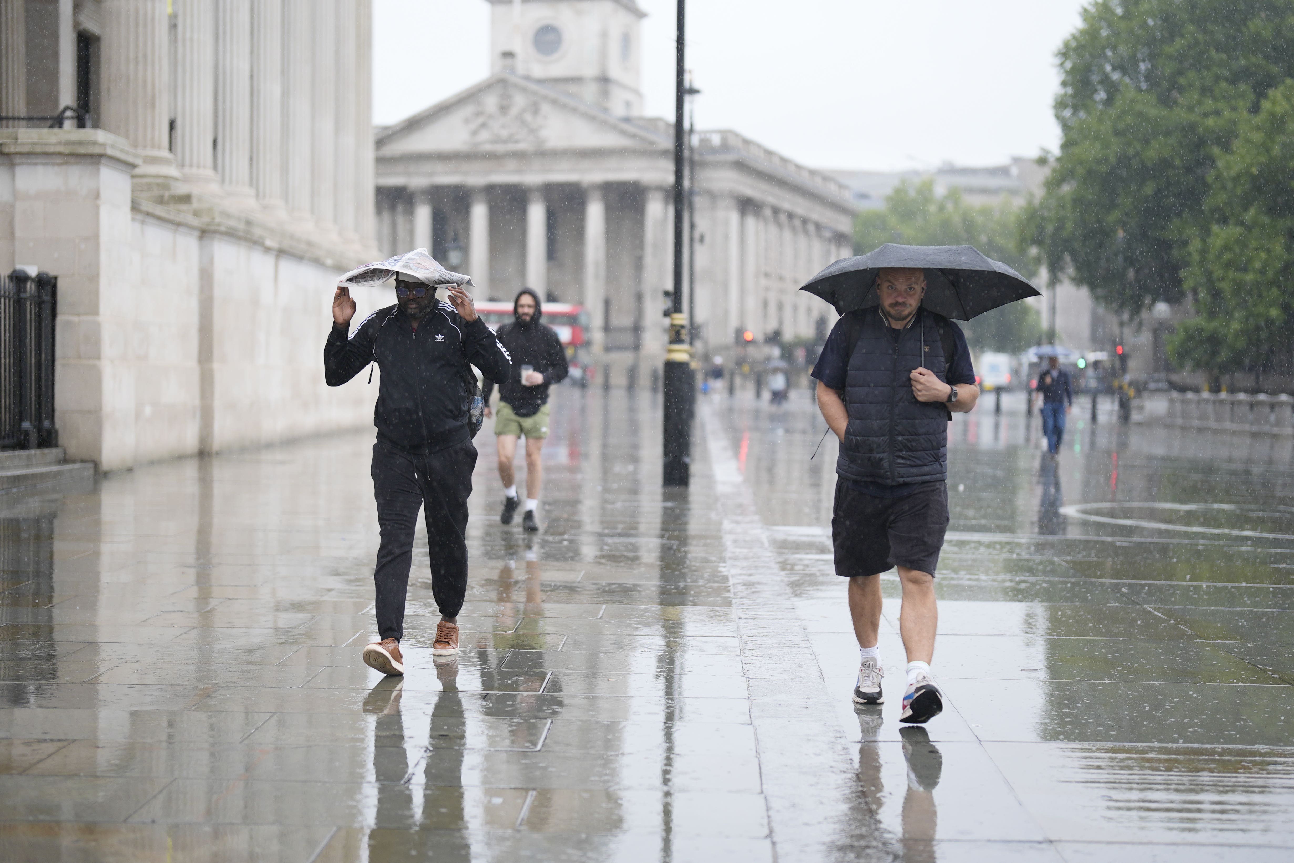 Rain in Trafalgar Square (Jordan Pettitt/PA)