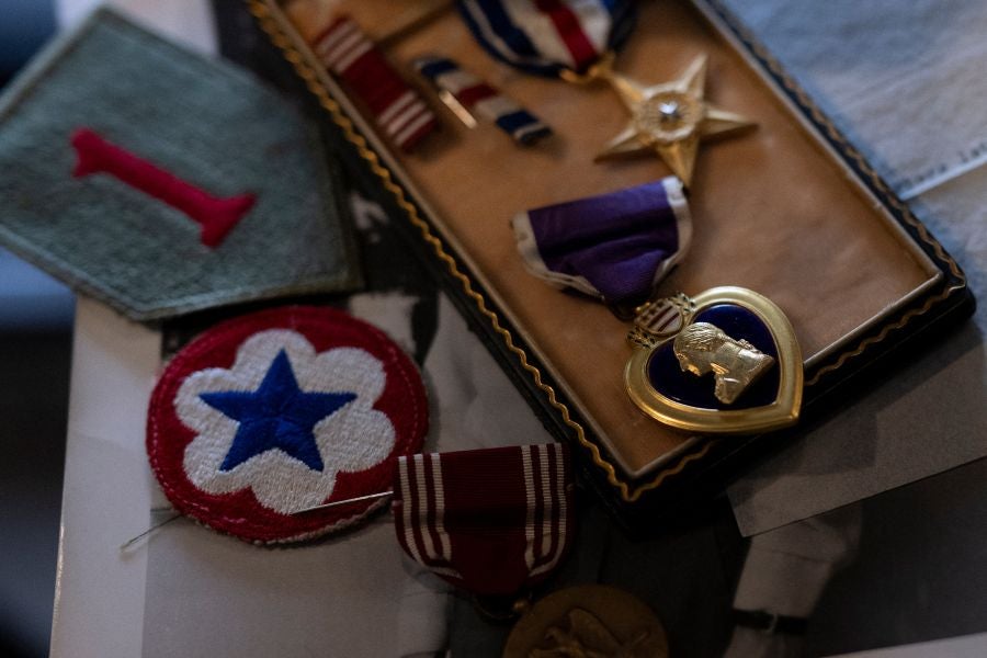 A Michigan man is looking to connect with the families of Carl G. Granacher and Milford Magnuson after finding their historical items in an unopened safe he bought at a garage sale