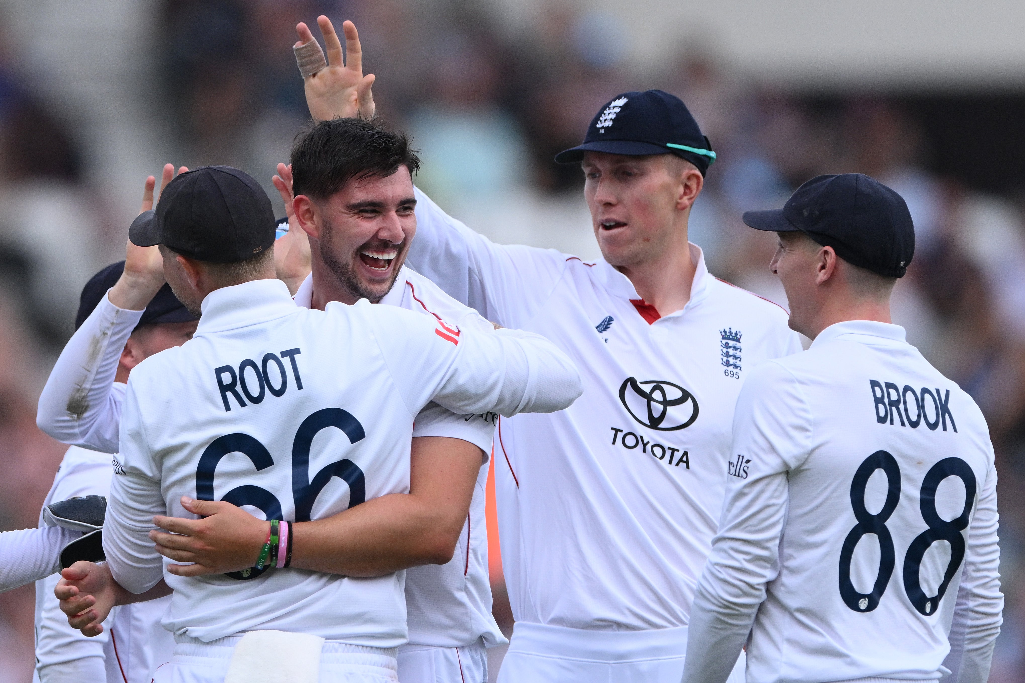 England celebrate after Josh Tongue, second left, dismisses Ravindra Jadeja