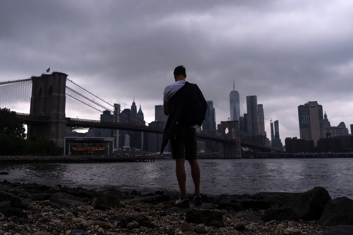Boy dies after being swept into drain pipe during East Coast flooding