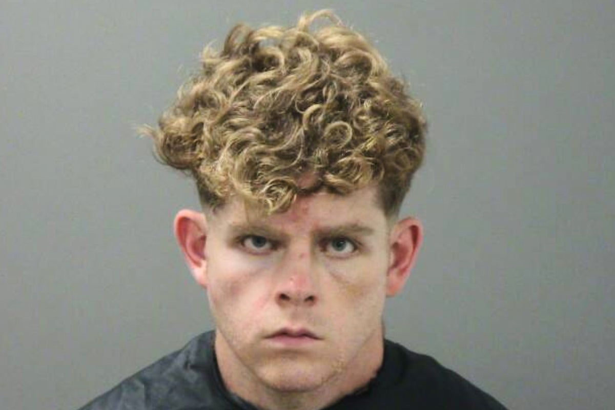 Teacher admits to stabbing couple to death while they were hiking with their children in Arkansas, police say