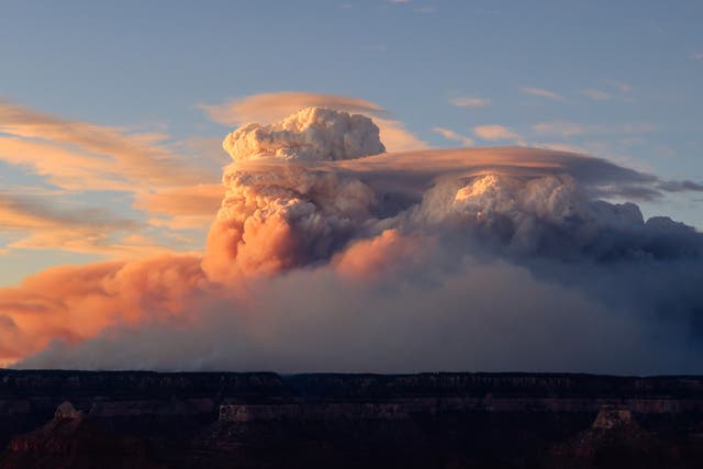 <p>“Fire clouds” form near the Bright Angel Trailhead at the South Rim of the Grand Canyon in Arizona on Sunday</p>