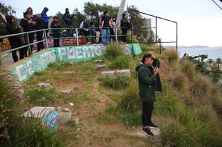 Citizens of the port of Valparaiso look at the sea during an evacuation plan due to a tsunami alert on July 30, 2025