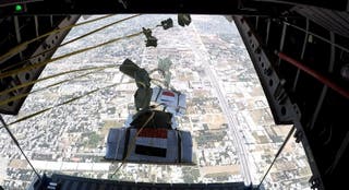 Humanitarian aid packages from Egypt are airdropped over Gaza