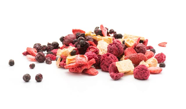 <p>Freeze-dried berries mix stack isolated on white background</p>