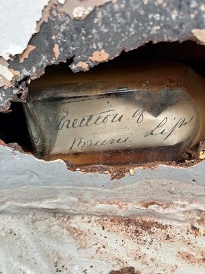 The bottleat found at Cape Bruny Lighthouse in Tasmania by a specialist painter
