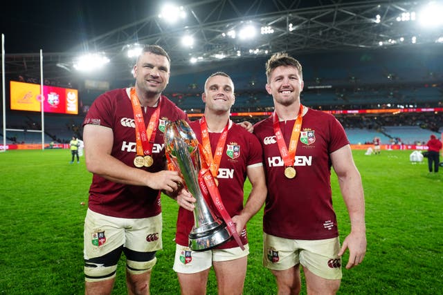 <p>Lions trio Tadhg Beirne (left), Ben Earl (centre) and Tom Curry celebrate with the trophy after winning the series 2-1 against Australia despite a final Test defeat in Sydney</p>