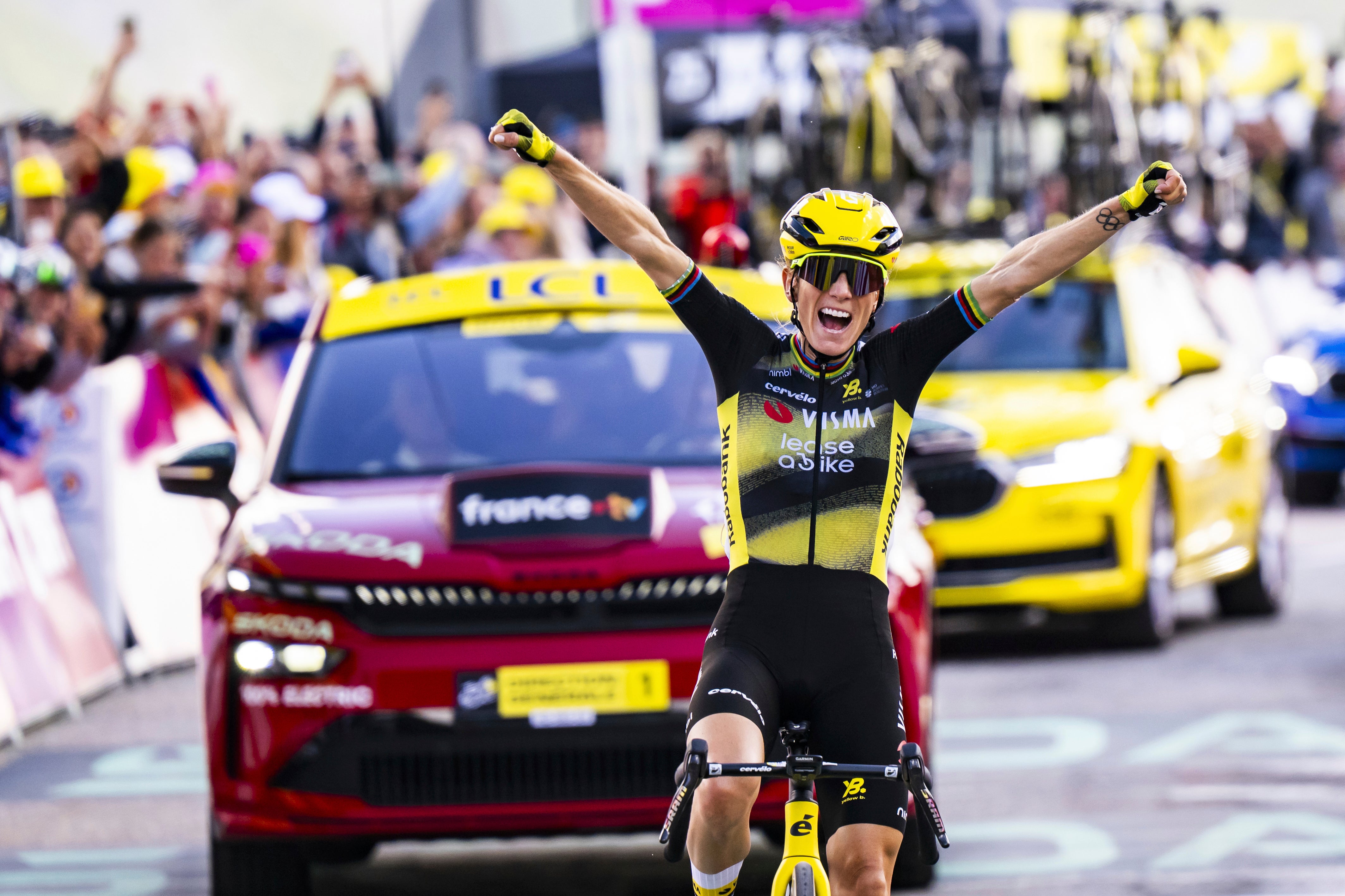 <p>Pauline Ferrand-Prevot from France of team Visma - Lease a Bike celebrates as she crosses the finish line to win the 8th stage of the Tour de France Femmes</p>