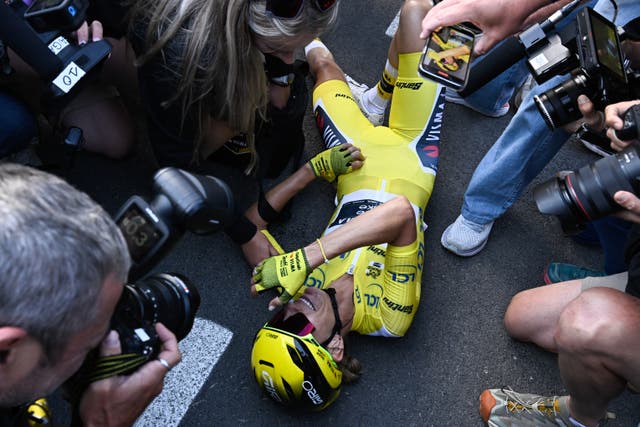 <p>Pauline Ferrand-Prevot celebrates winning the Tour de France Femmes</p>