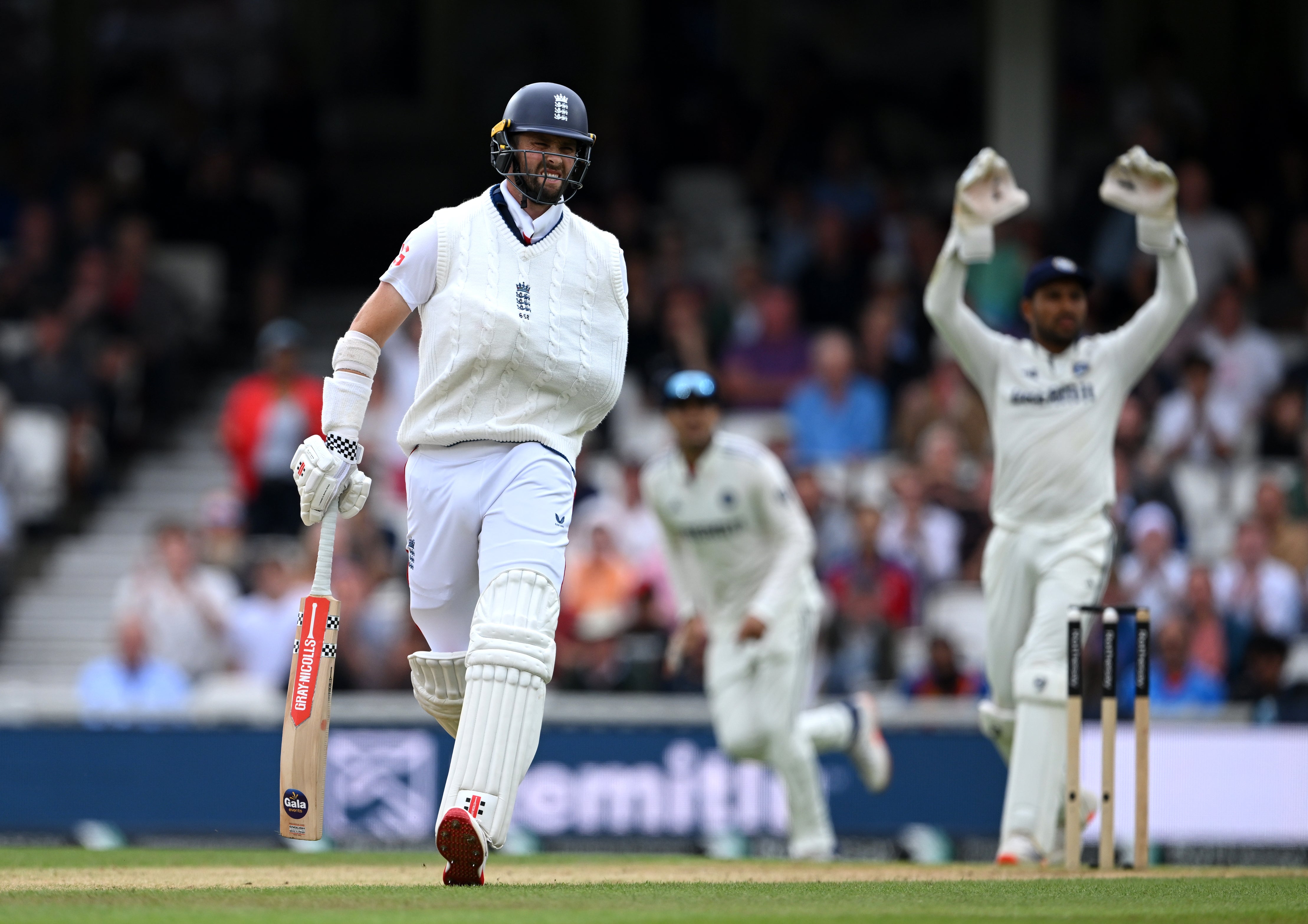 Chris Woakes of England grimaces