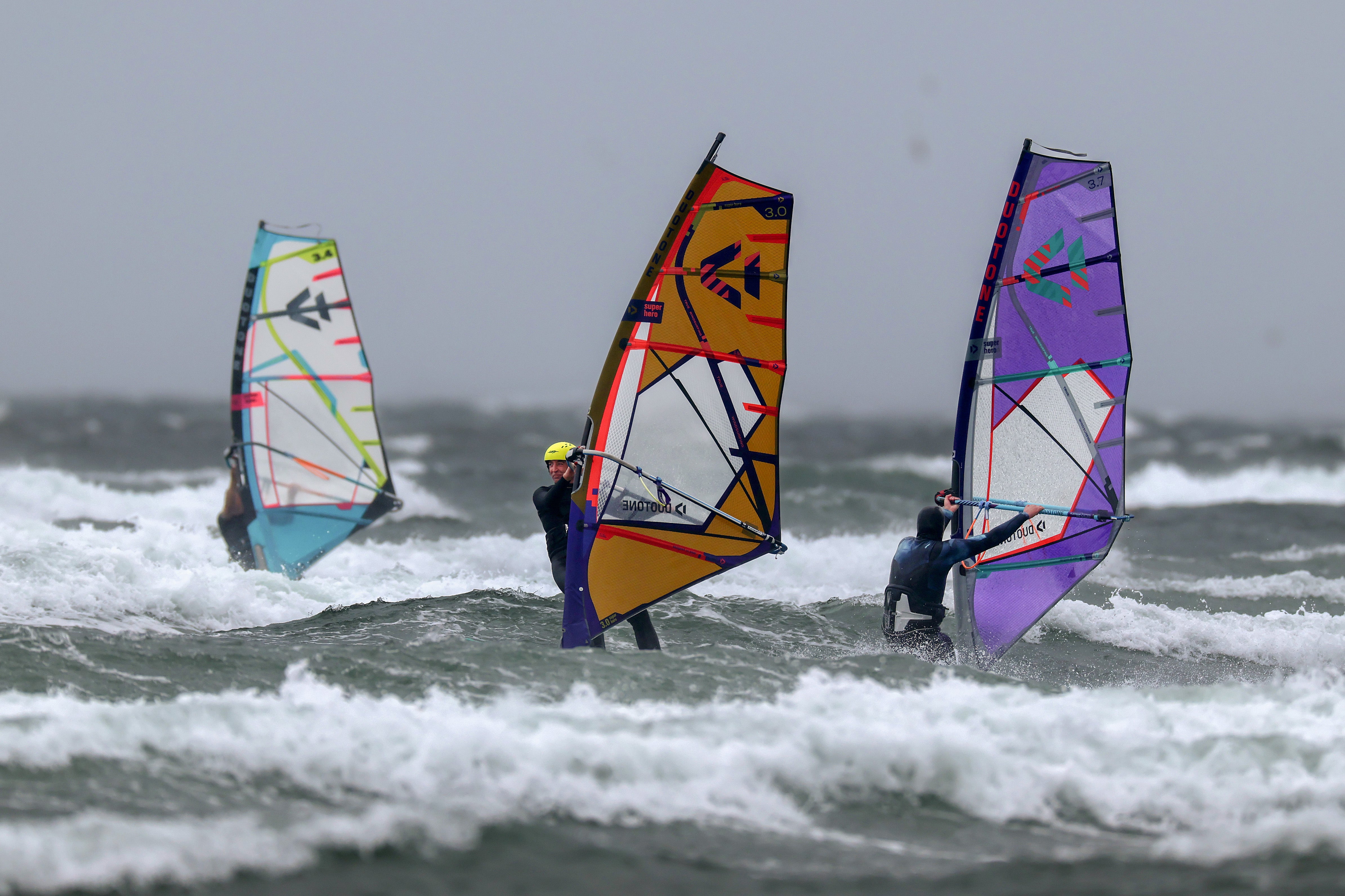 Windsurfers on Troon beach during Storm Floris