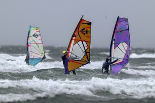 Windsurfers on Troon beach during Storm Floris