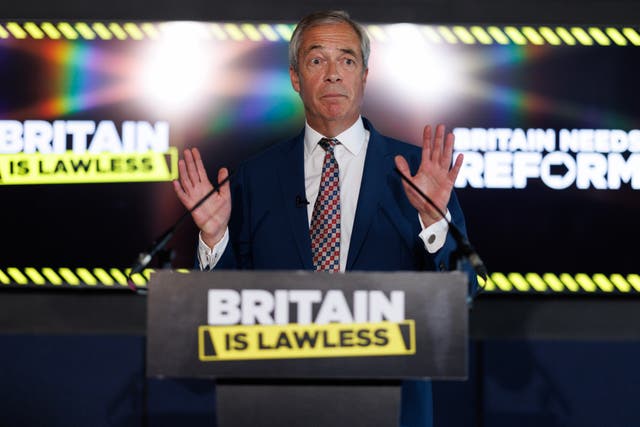 <p>Nigel Farage unveils his Reform UK party’s new slogan, ‘Britain Is Lawless’</p>