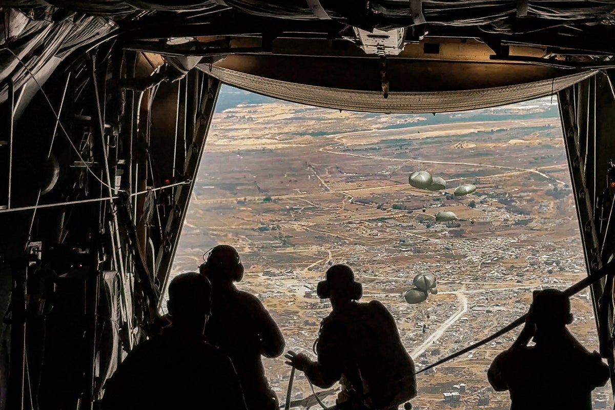 Inside the aid drops onto Gaza’s torched ruins - with the starving too weak to fight for food