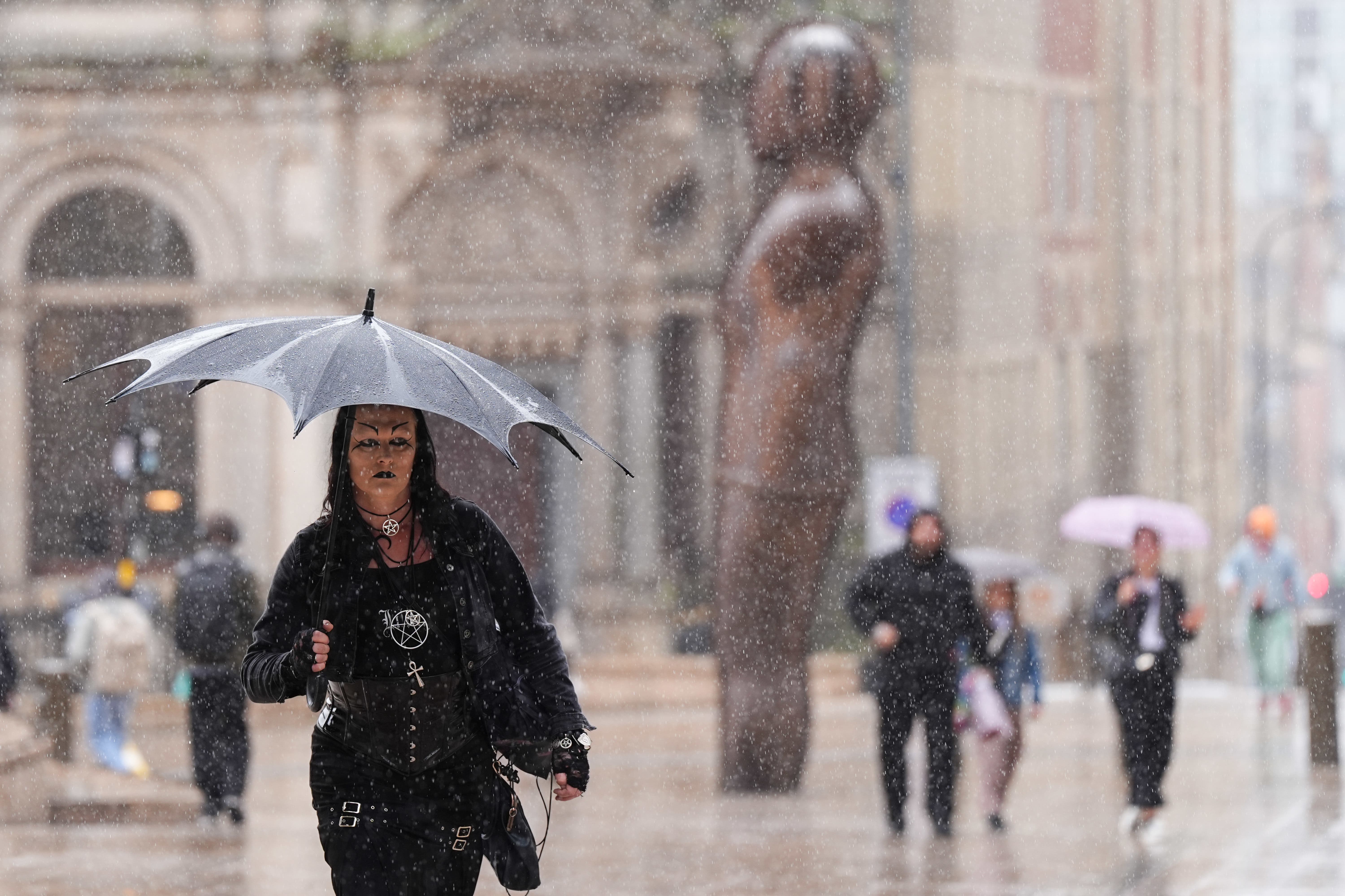 Umbrellas were out in force in Birmingham (Jacob King/PA)