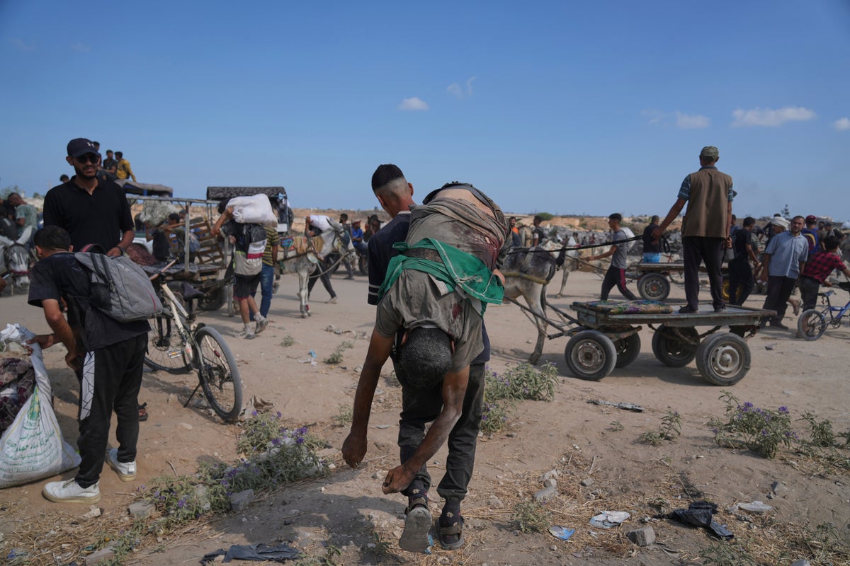 Dozens killed as Palestinians in Gaza scramble for aid from air and land