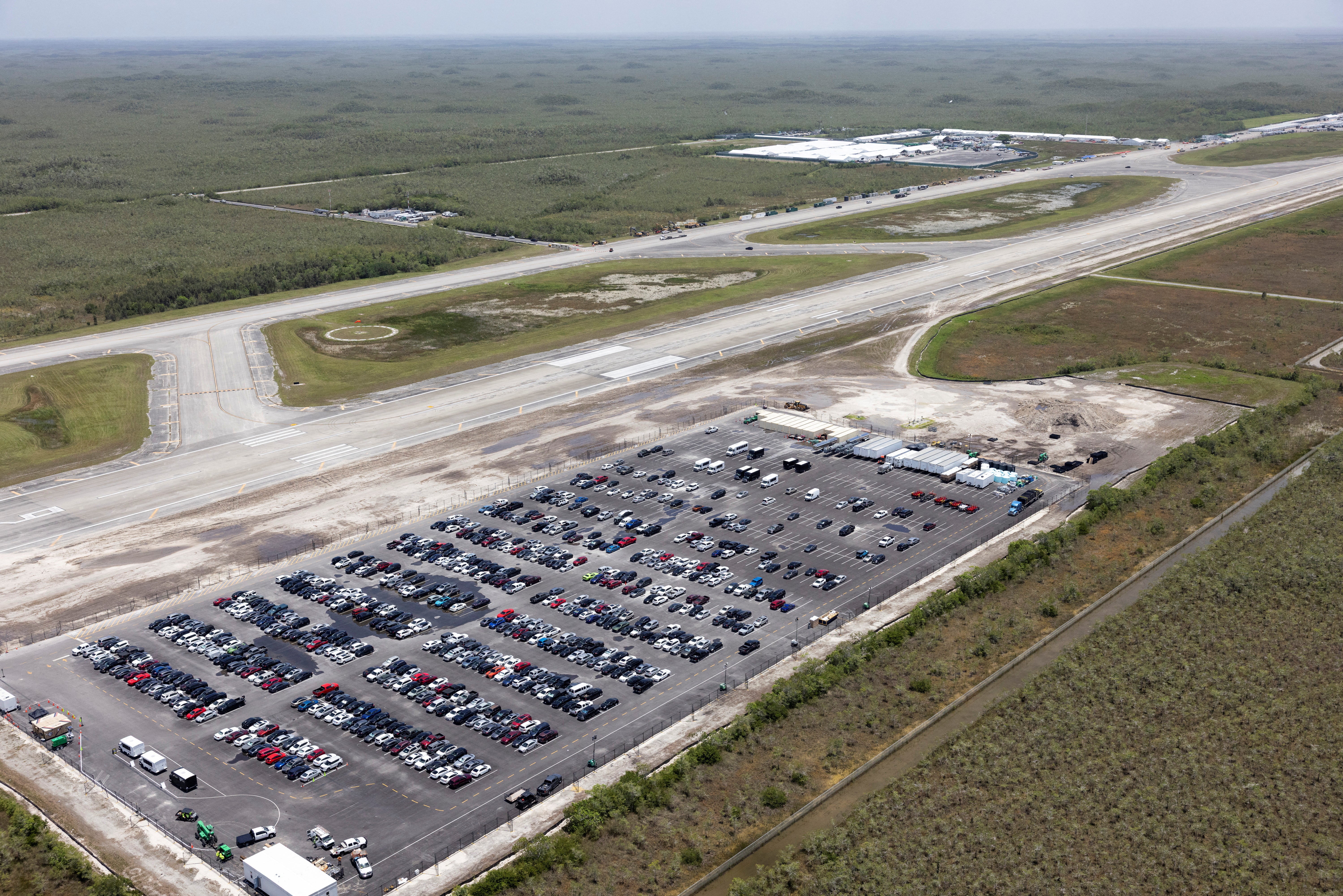 A federal lawsuit accuses the makeshift facility in Florida’s Everglades of blocking detainees from legal access while forcing them to endure ‘overcrowded, unsanitary, and harsh conditions’