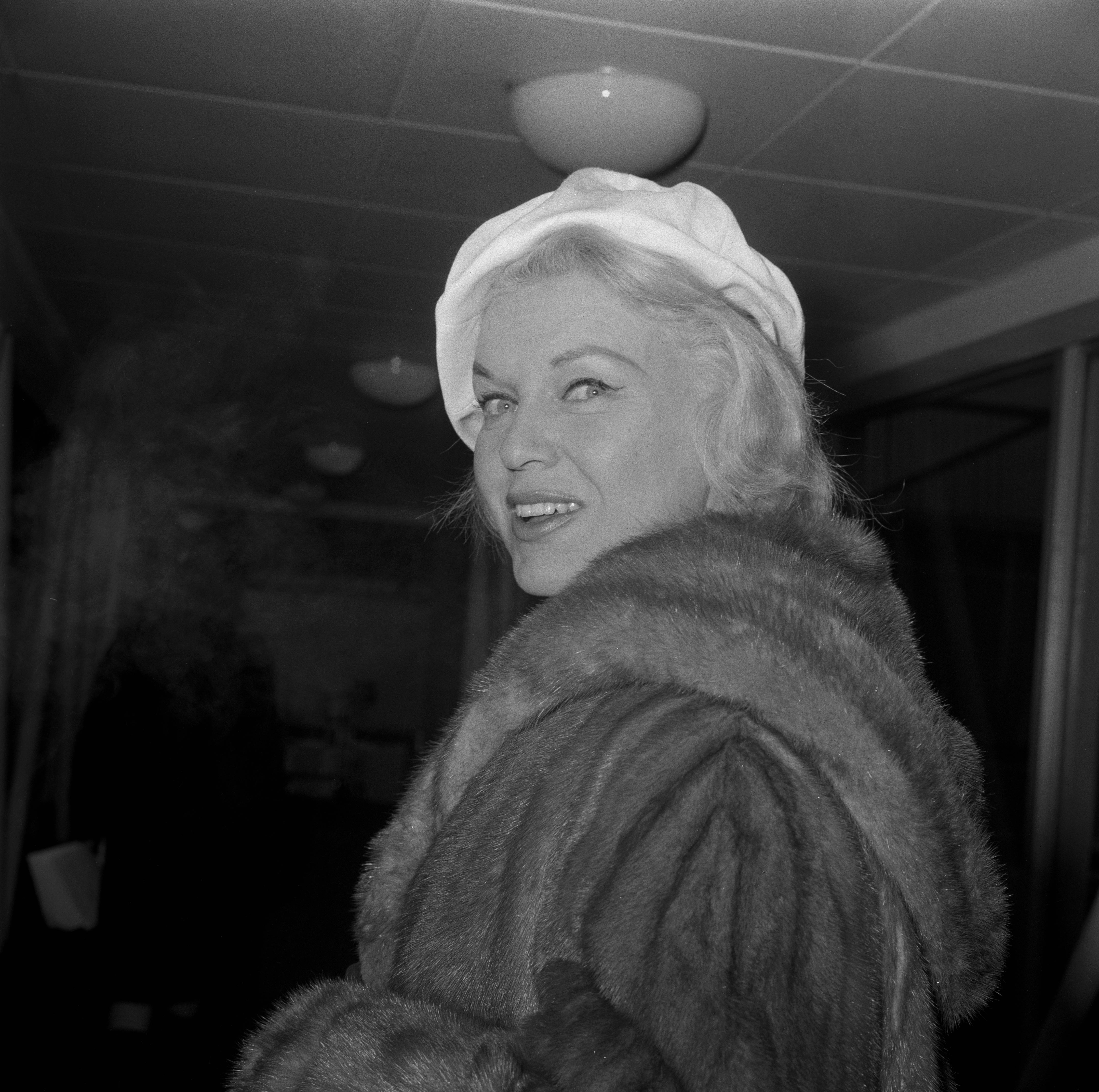 Jane Morgan photographed at London's Heathrow Airport on January 25, 1964
