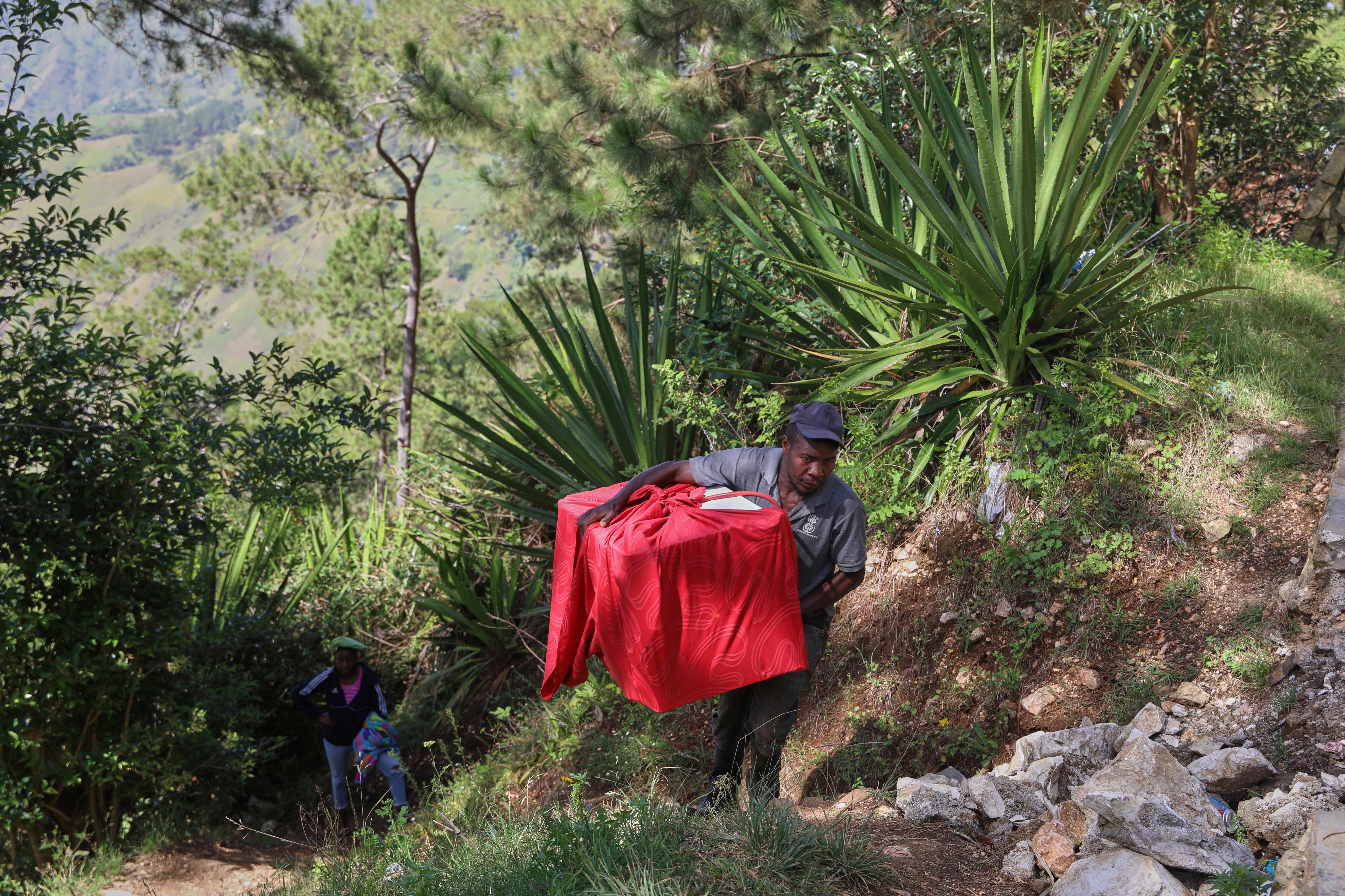 Residents flee their homes to escape the gang violence in Kenscoff