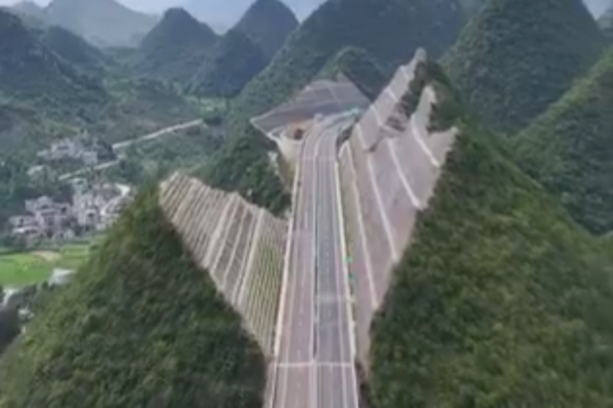 Engineers carve mountain in half to make way for world’s tallest bridge