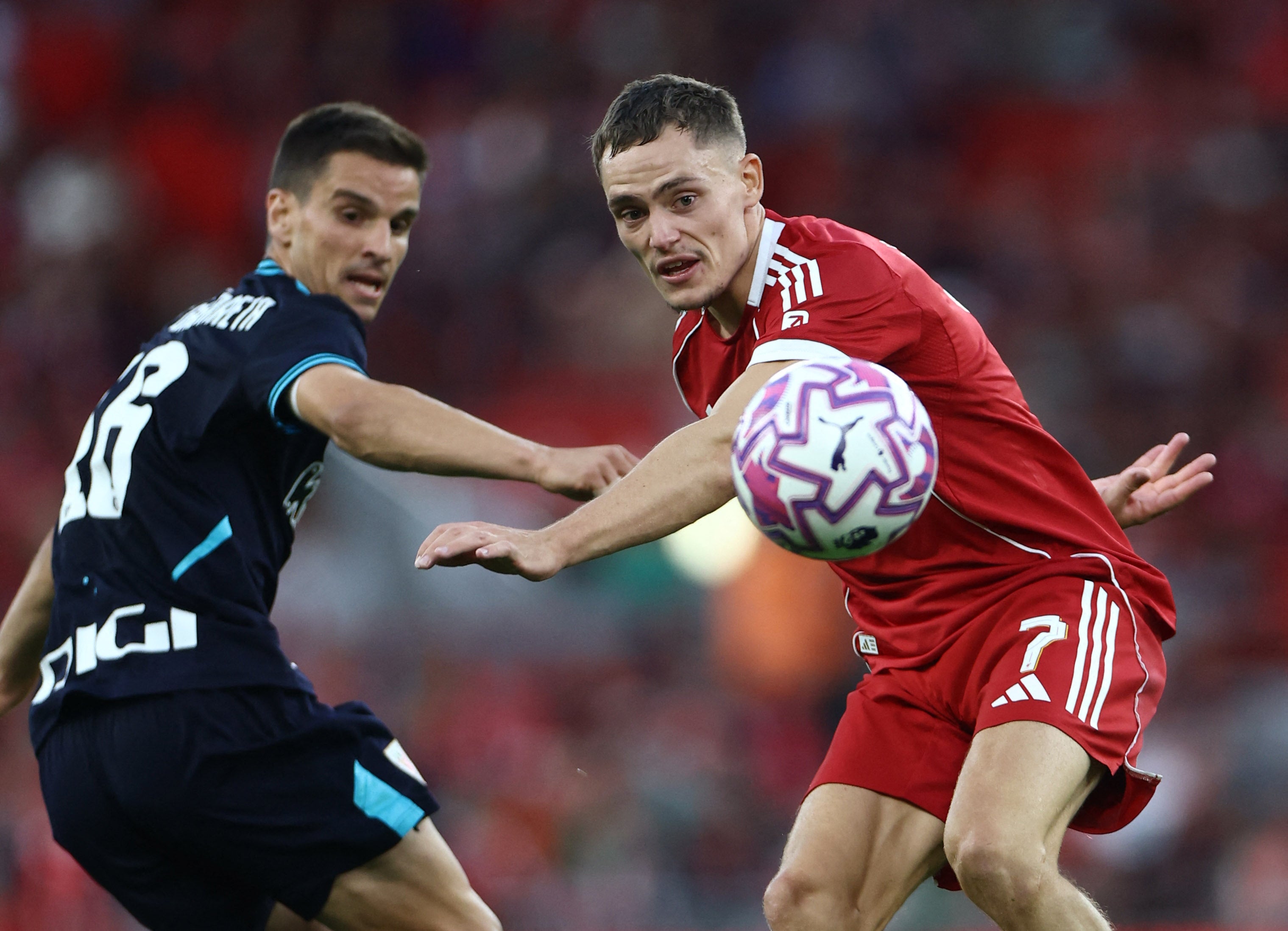 Florian Wirtz in action with Athletic Bilbao’s Inigo Ruiz de Galarreta