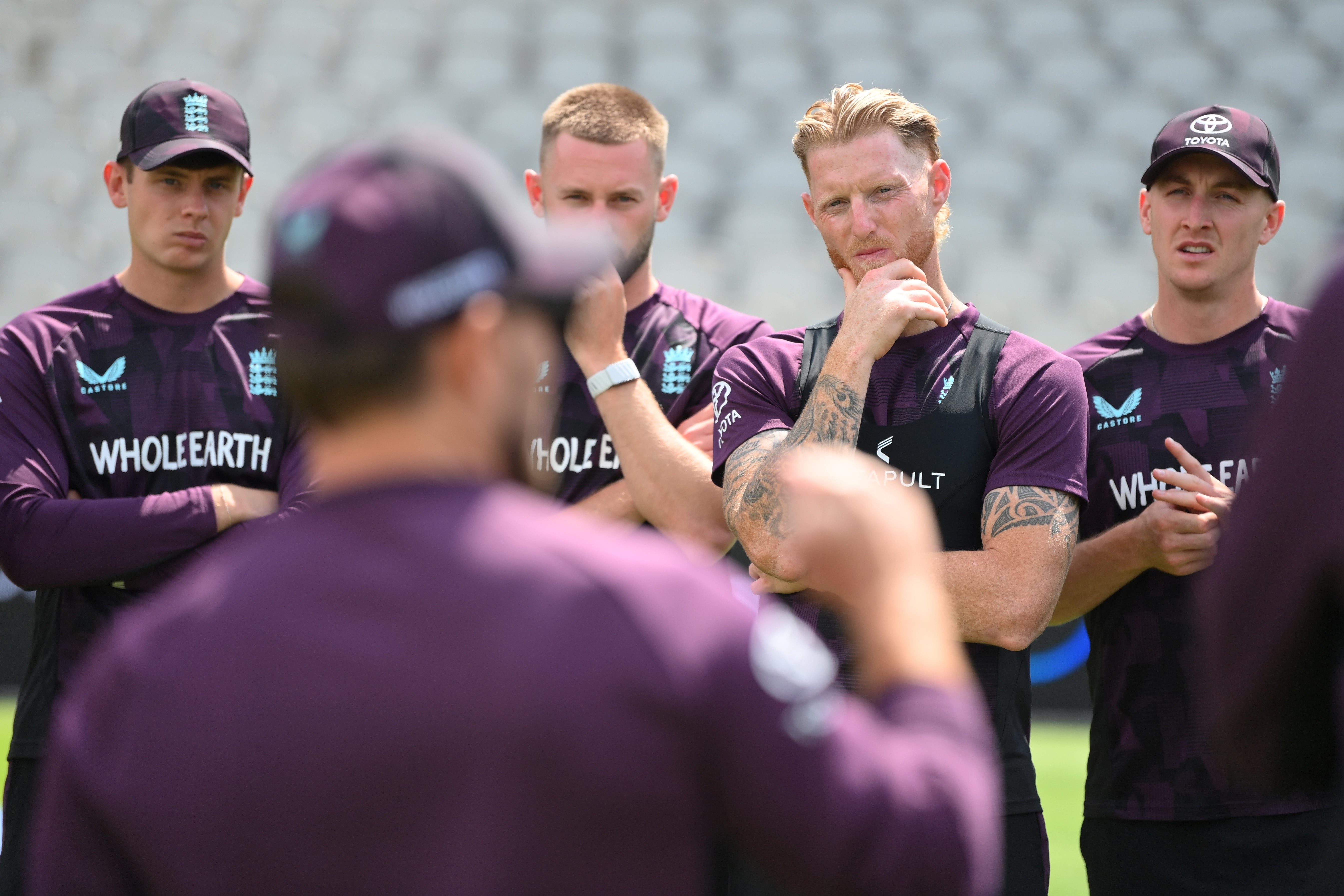 England's players listen as Brendon McCullum speaks at Old Trafford