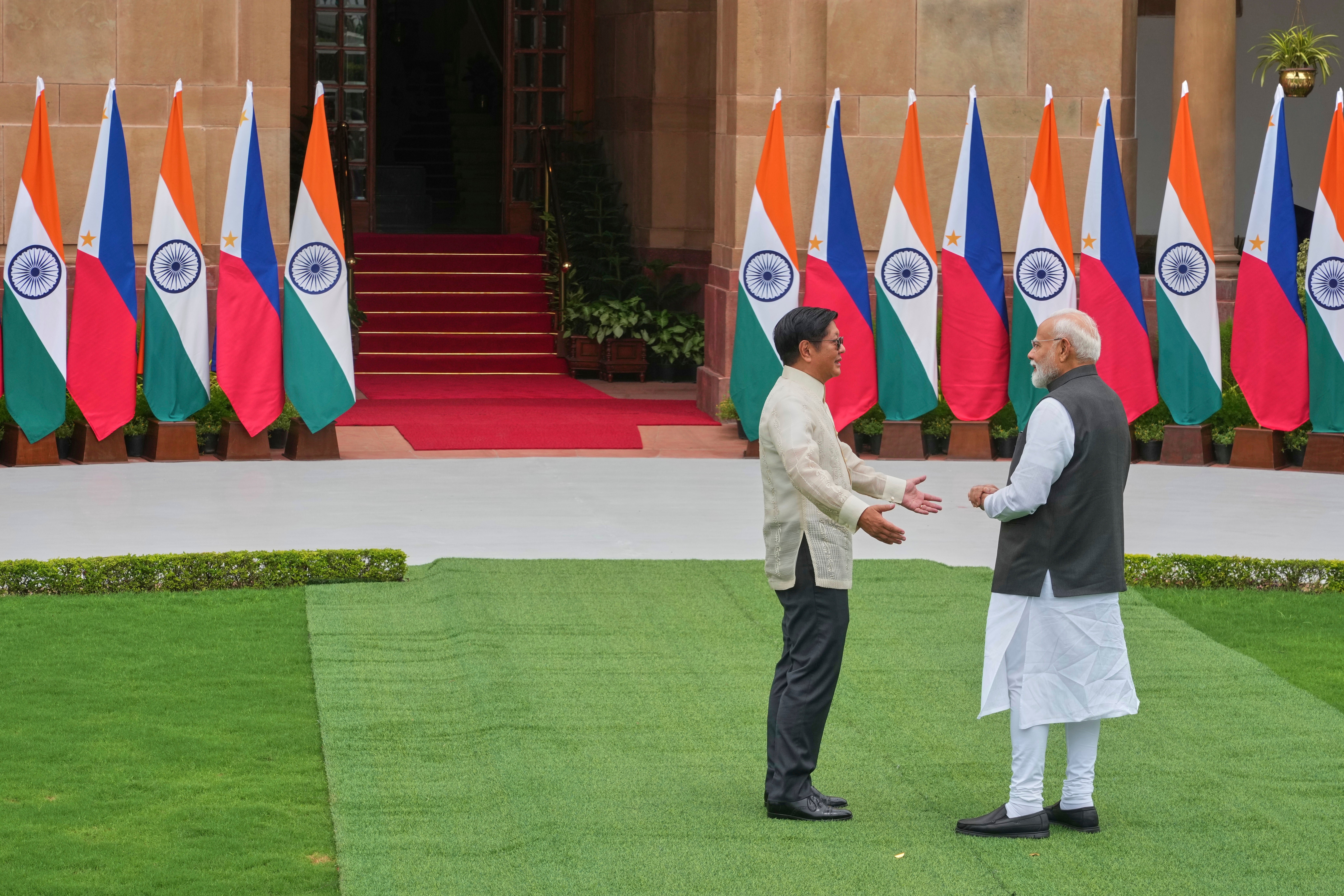 Philippines president Ferdinand Marcos Jr walks with Indian prime minister Narendra Modi before their delegation level talks in New Delhi