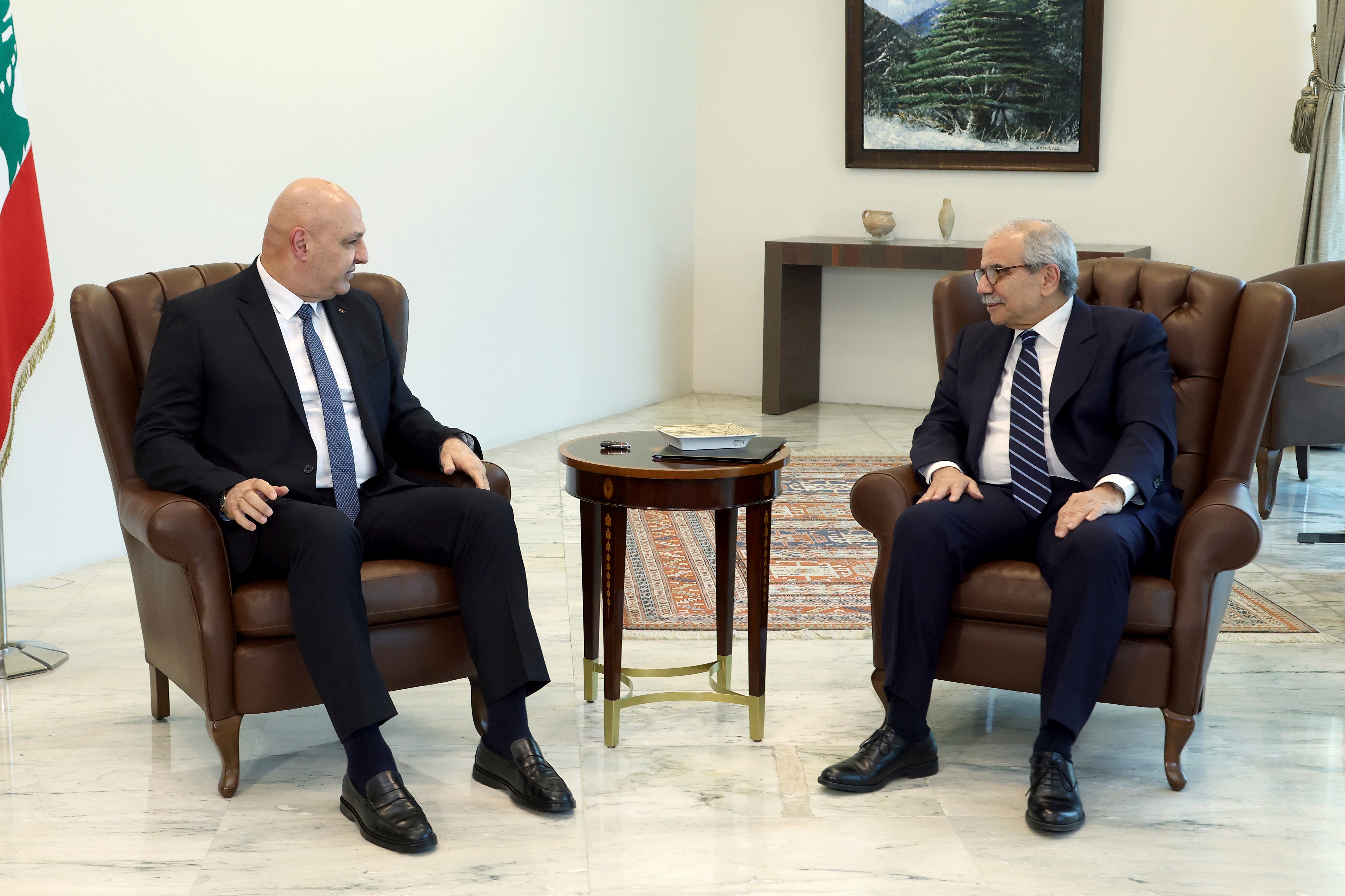 Lebanese President Joseph Aoun, left, called for Hezbollah to give up its weapons