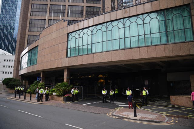 Police officers outside The Britannia International Hotel in Canary Wharf, London (James Manning/PA)