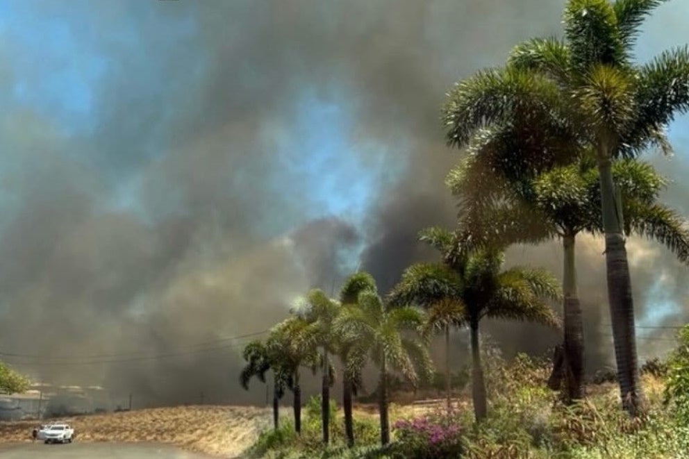 Smoke from a wildfire fills the air on Maui, Hawaii, on Monday