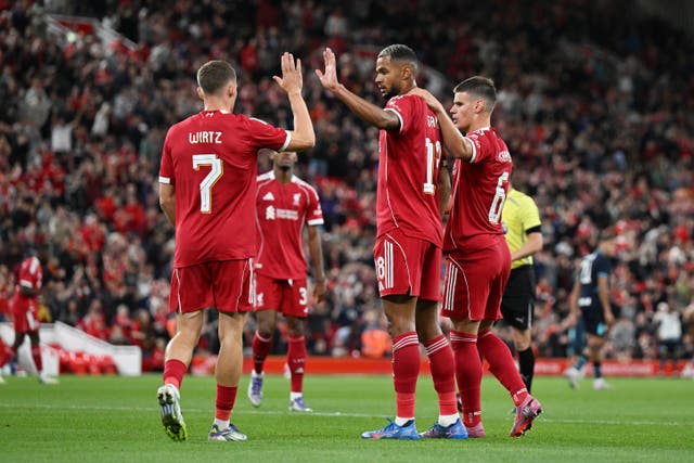 <p>Cody Gakpo celebrates scoring his team's third goal with Milos Kerkez and Florian Wirtz </p>