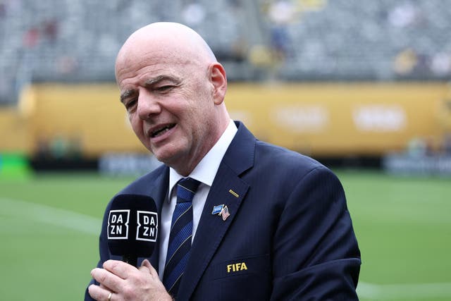 <p>Gianni Infantino gave his support to a female referee after she received death threats</p>