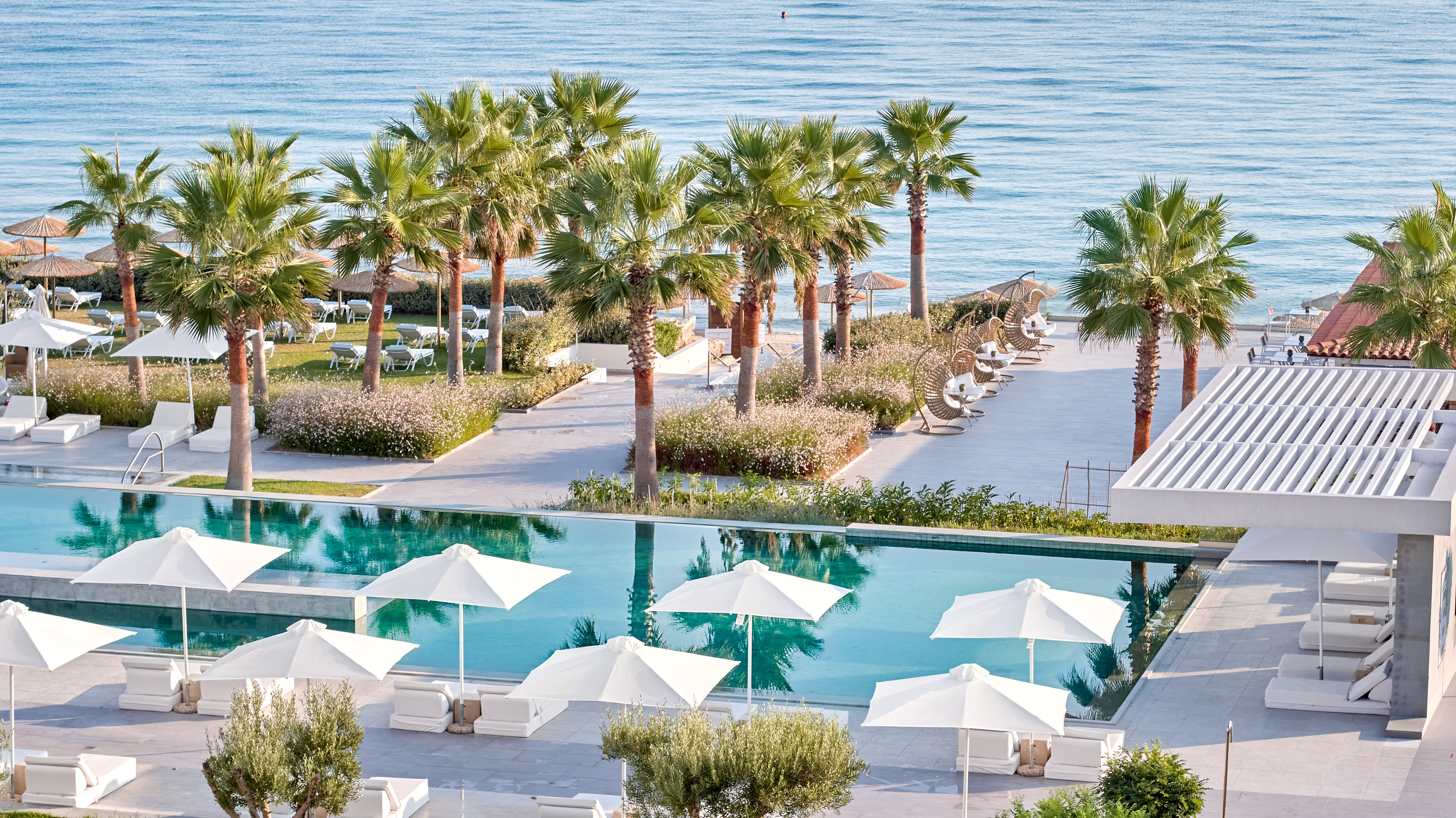 The pool is the perfect place to soak up some sunshine at Domes Noruz Kassandra in Halkidiki